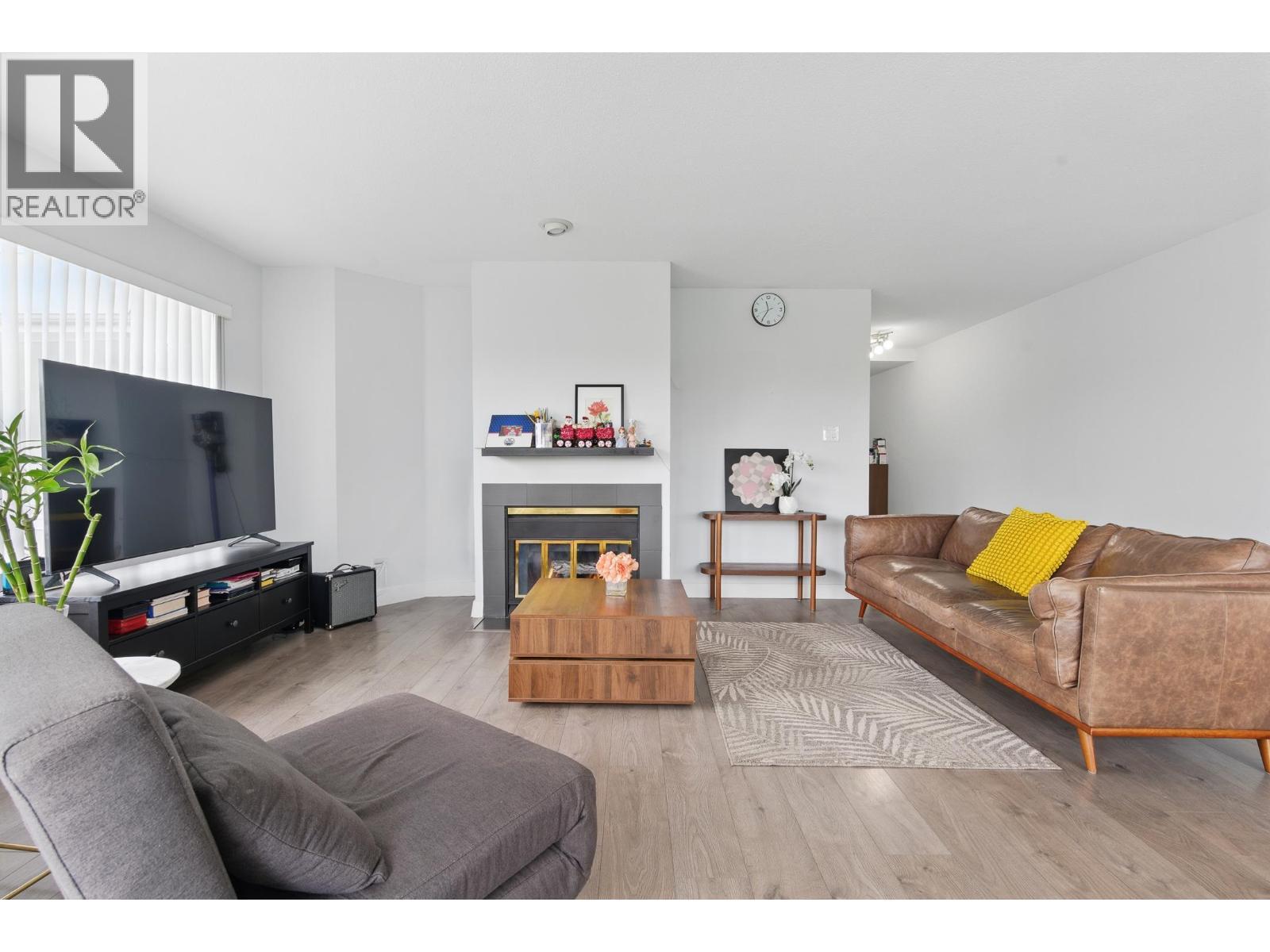 104 7480 GILBERT ROAD