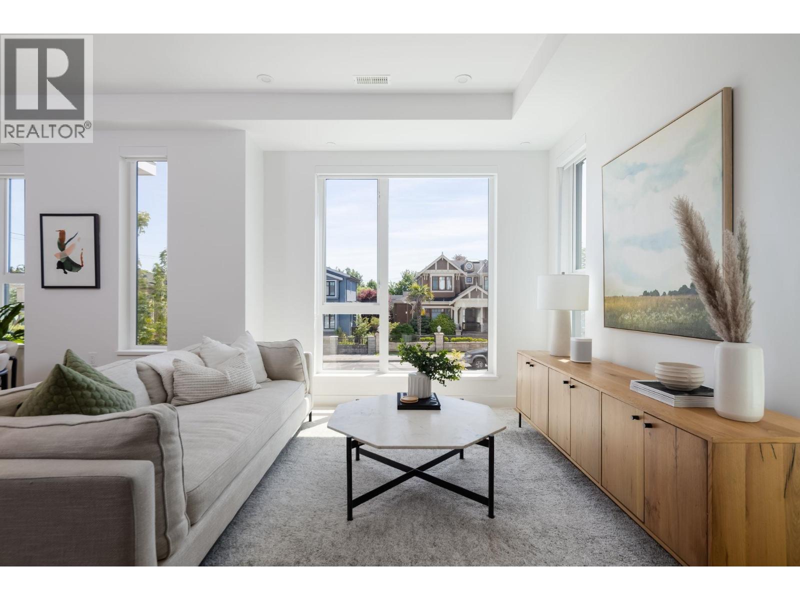 213 715 W 49TH AVENUE