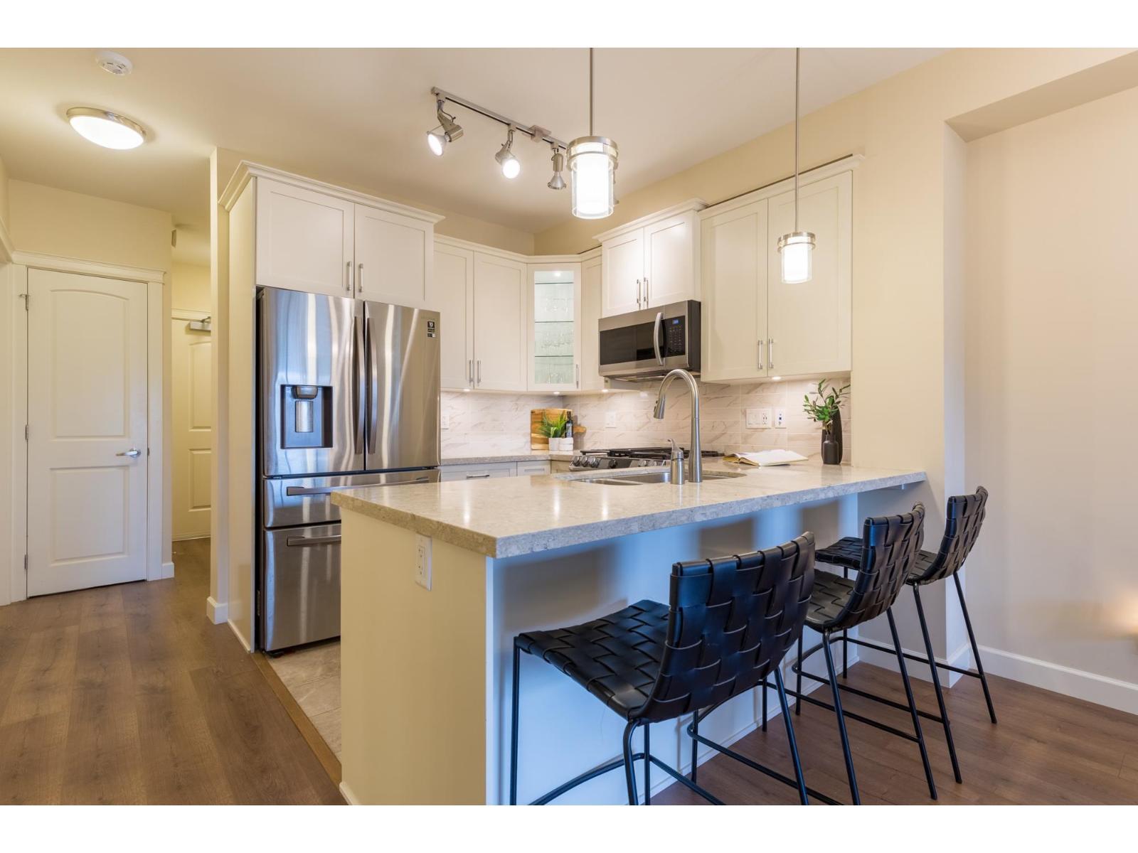 311 8561 203A STREET