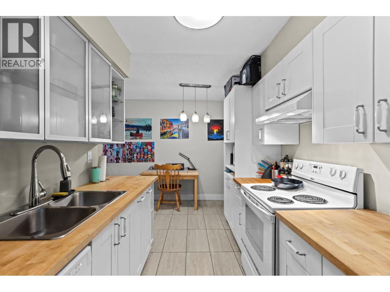 112 9847 MANCHESTER DRIVE